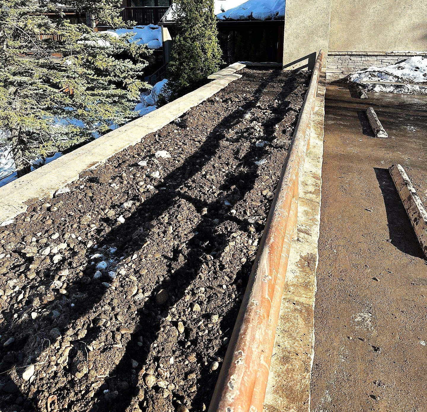 Drain line and gravel placed before backfill