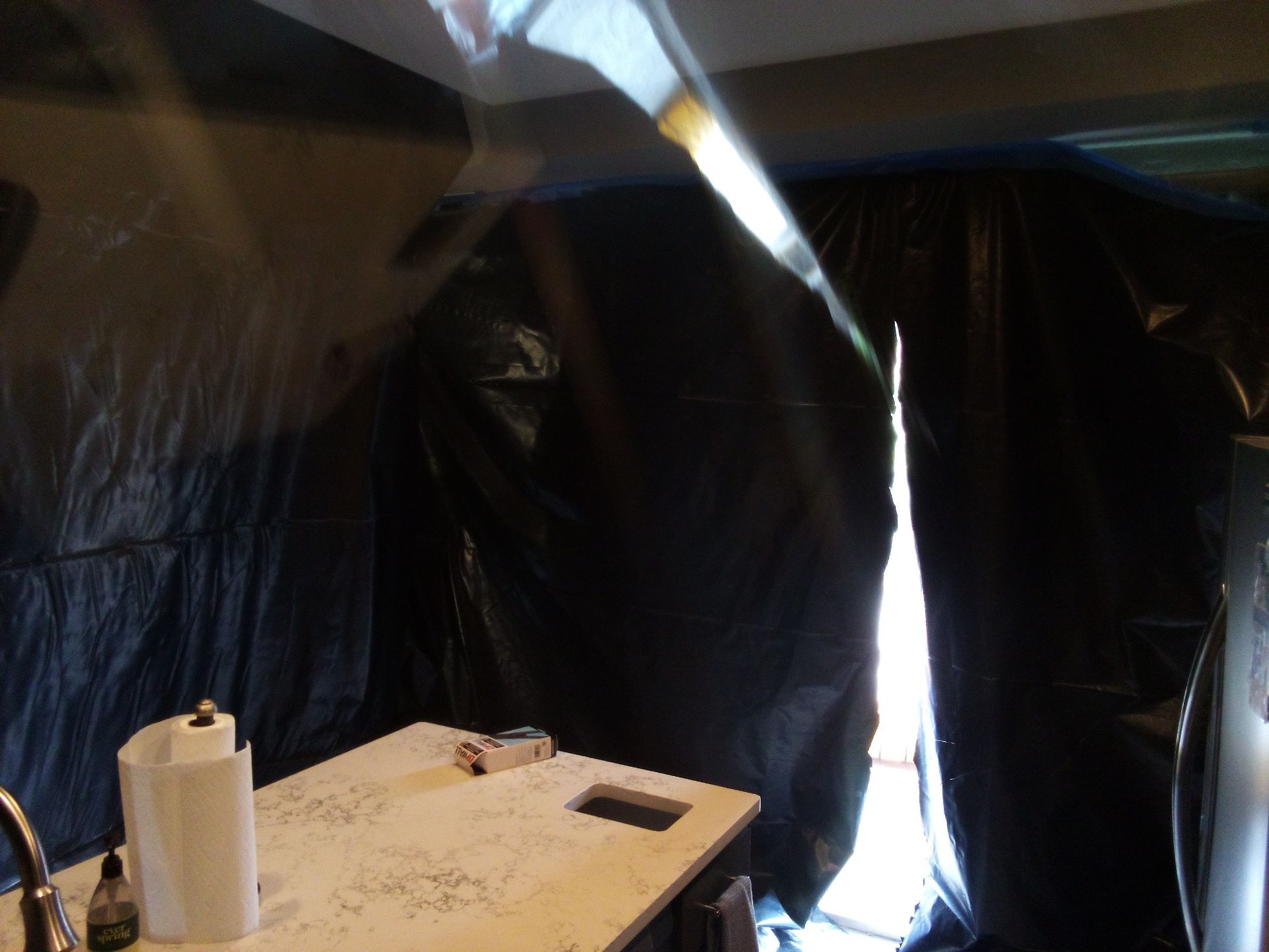 Containment barrier installed during encapsulation prep